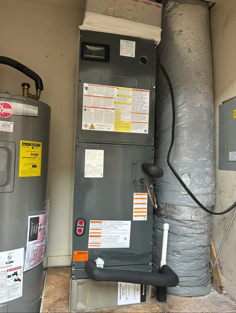 Vertical residential air handler tied into ducted system